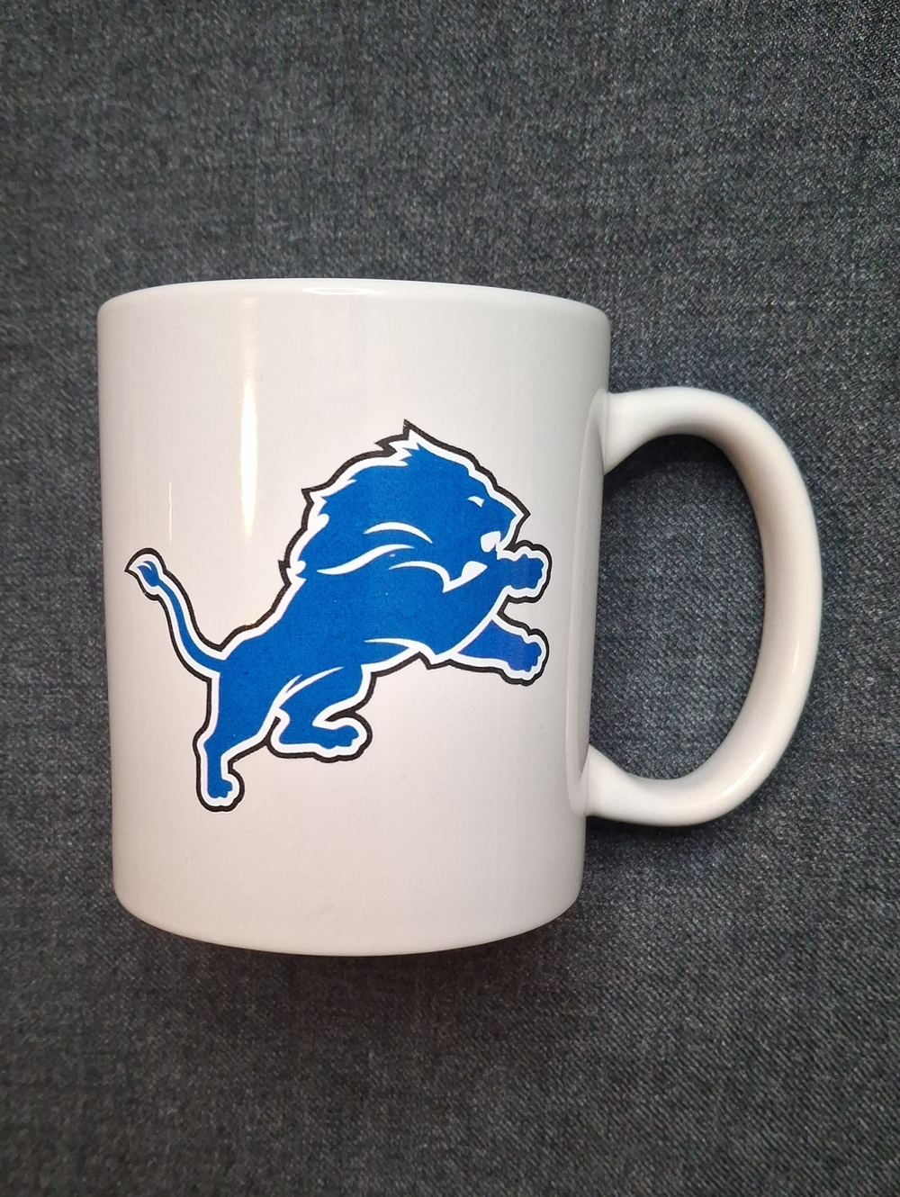 White Ceramic Mug with Blue Lion Team Logo